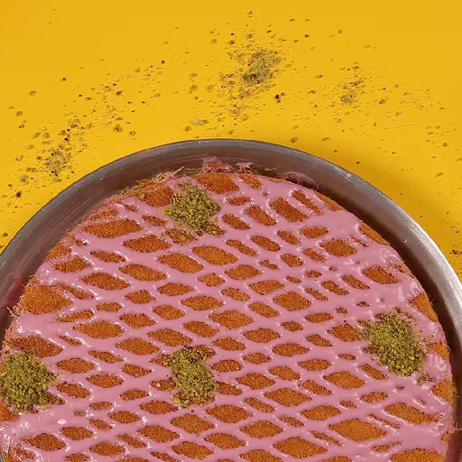 Collection of four insulated travel bottles on wooden shelf.